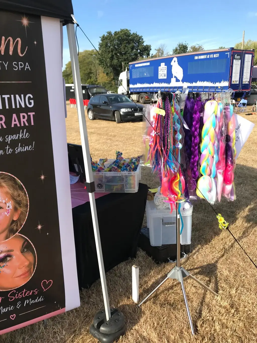Colourful braiding hair at the Glitter Sisters festival stand